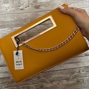 Mustard yellow clutch with cross body strap 💛